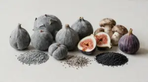 Assortment of naturally gray foods and gray fruits arranged together on a tabletop